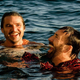Pascal and Cage laughing in the water